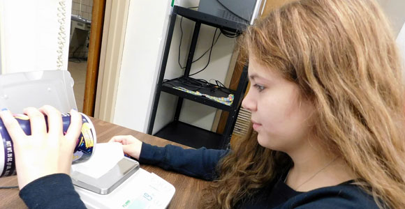 Student experimenting with salt